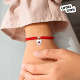 Pulsera trenzada Corazon dentro de un corazón es blanco y rojo