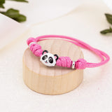 Pulsera cordón Panda con esmalte blanco-negro y rosa